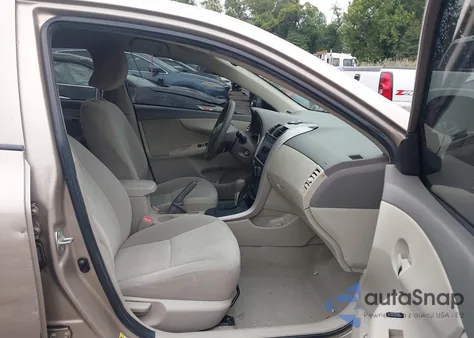 2009 Toyota Corolla Le from USA, damaged, VIN 2T1BU40EX9C169221